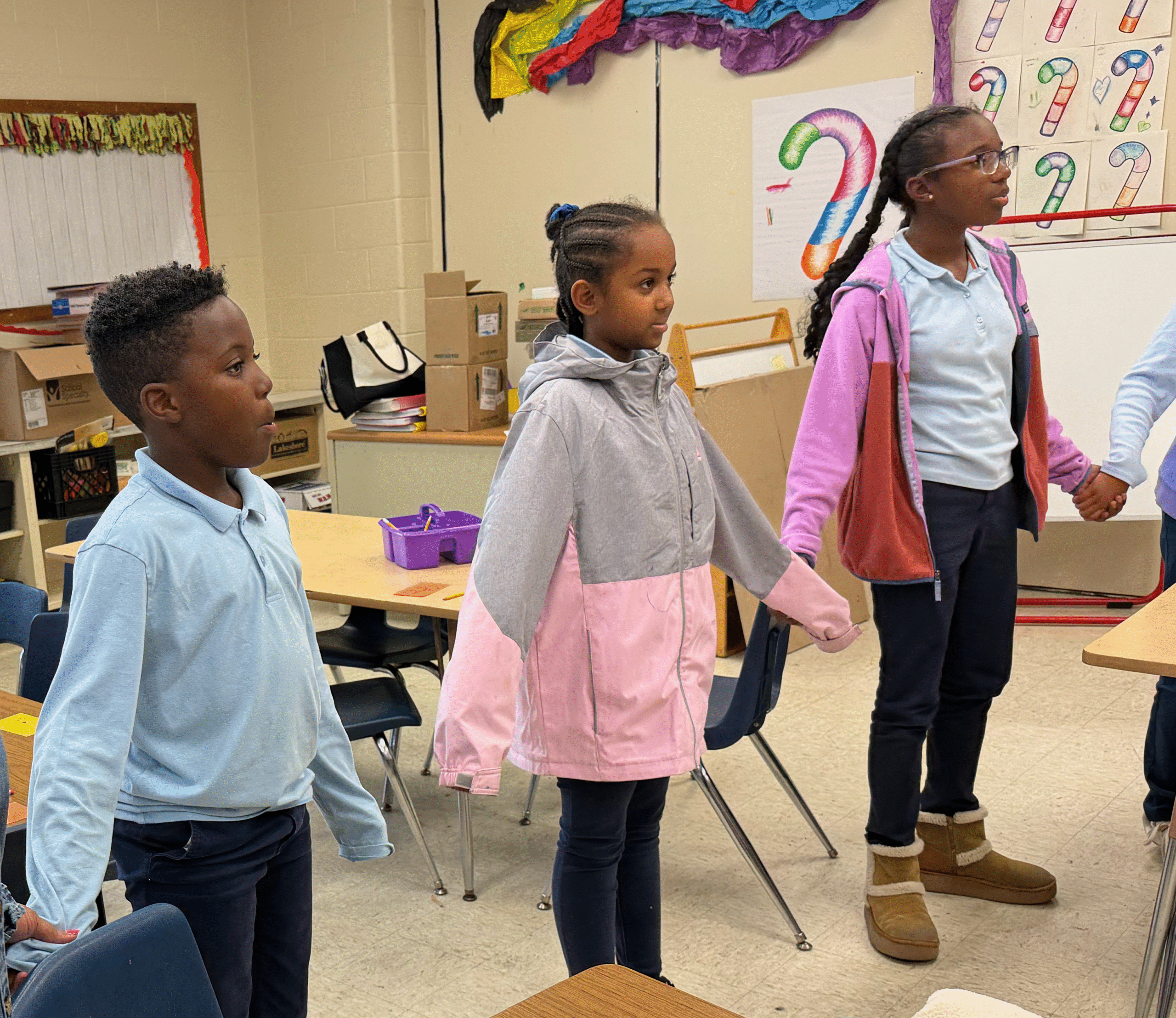 students standing in a circle